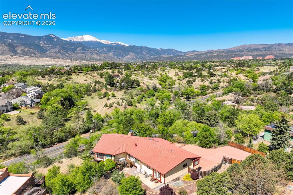 Image 49 of 50: What a view of Pikes Peak and Garden of the Gods...