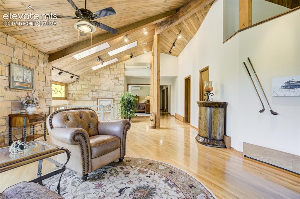 Image 7 of 50: Sitting room looking at grand entry