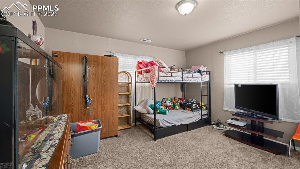 Image 19 of 36: Bedroom