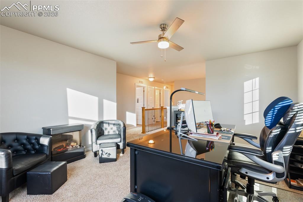 Image 15 of 33: Upper-level loft with flexible layout.