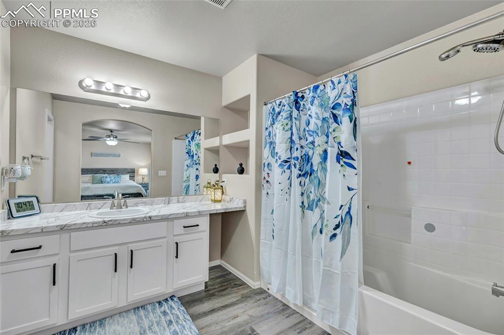 Image 20 of 38: Master Bath - double vanity & built-ins