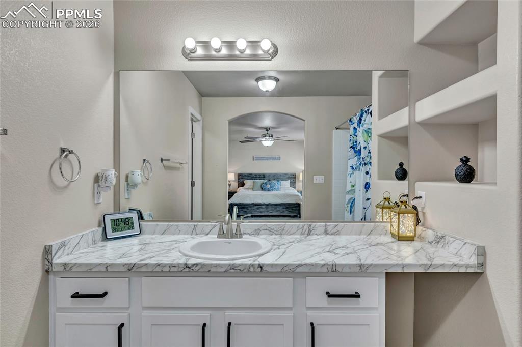 Image 21 of 38: Master Bath - double vanity & built-ins