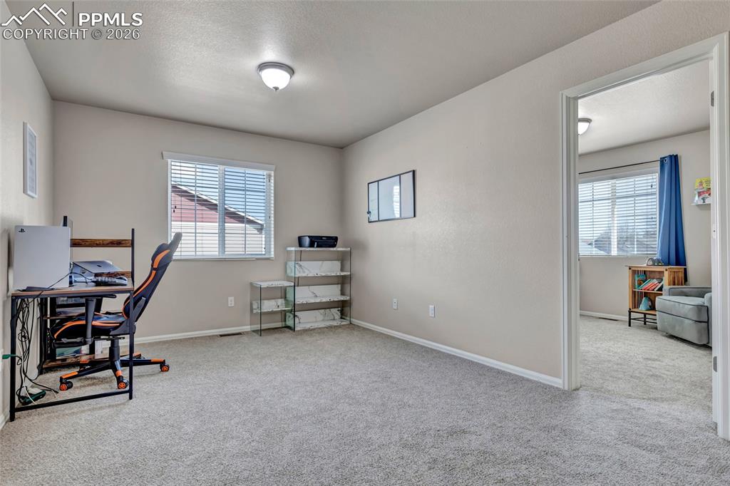 Image 23 of 38: Loft - office, crafts, play area, etc..