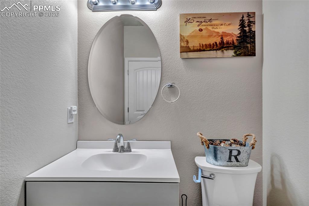 Image 31 of 38: Main level 1/2 bath