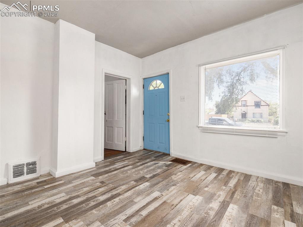 Image 20 of 30: Foyer featuring light wood-type flooring
