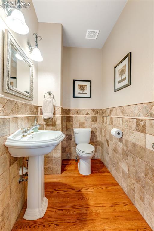 Image 21 of 50: Half Bath Main Level