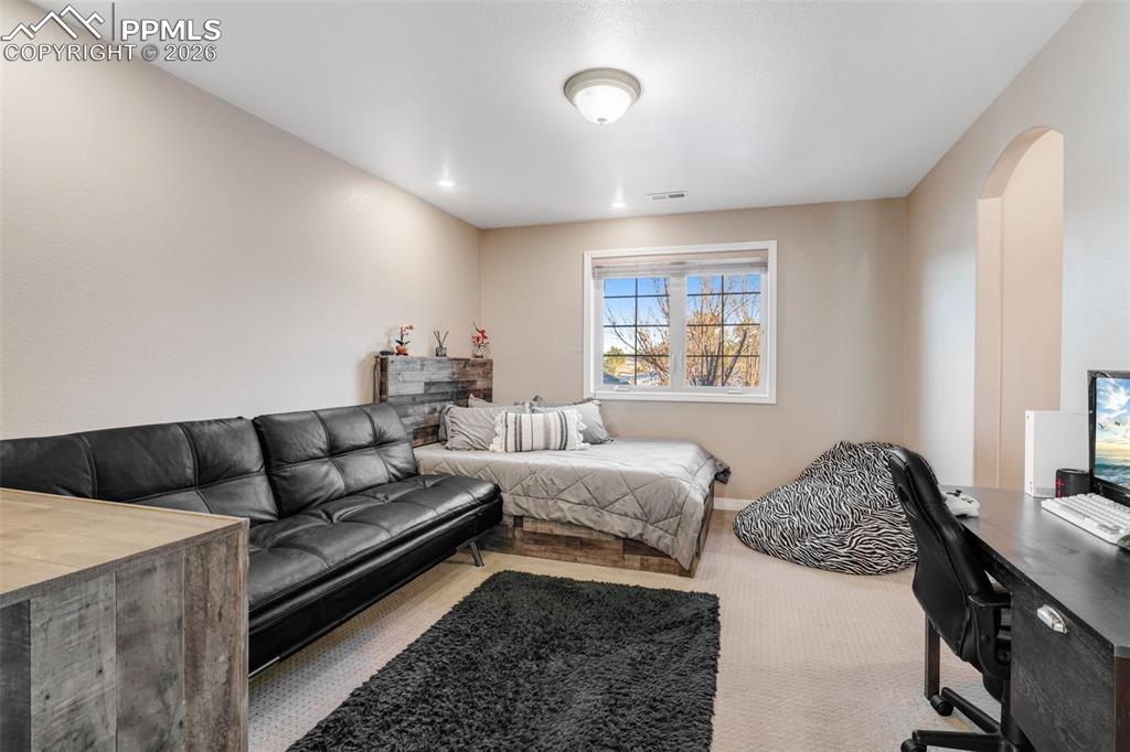 Image 24 of 50: Upper Bedroom 2 w/J&J Bath