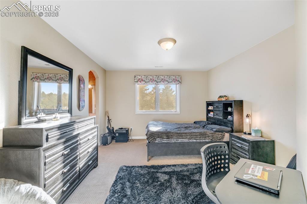 Image 28 of 50: Upper Bedroom 2 w/J&J Bath