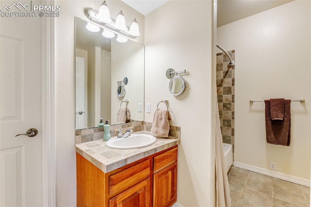 Image 35 of 50: Basement Bathroom En Suite