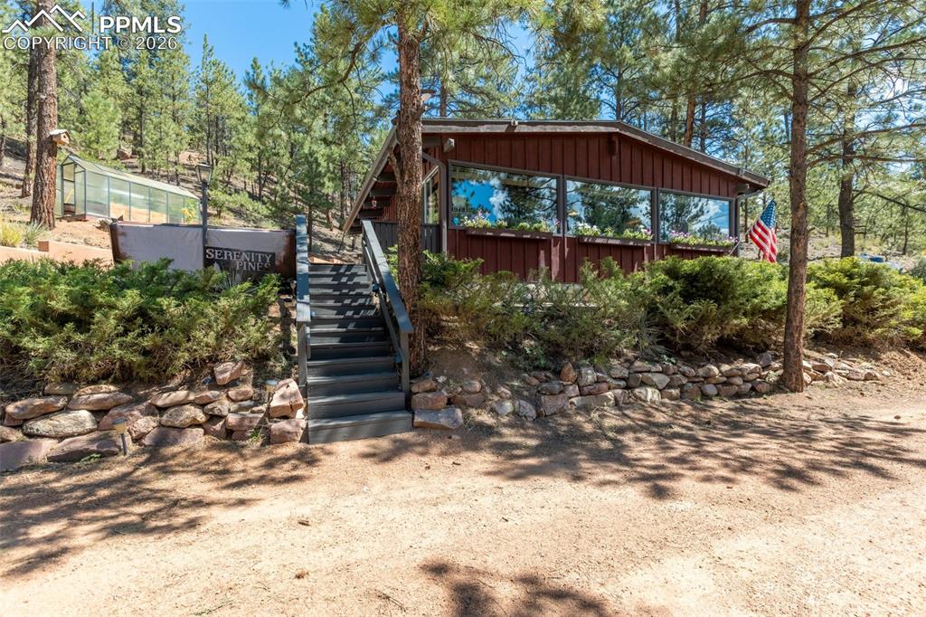 Image 1 of 46: Front windows and flowerboxes