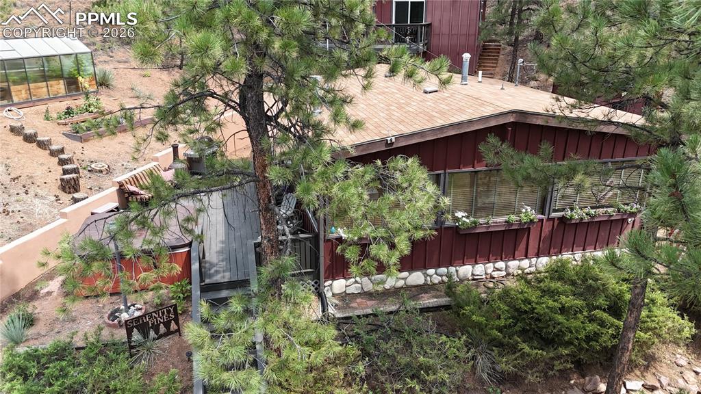 Image 19 of 46: Home, greenhouse and deck
