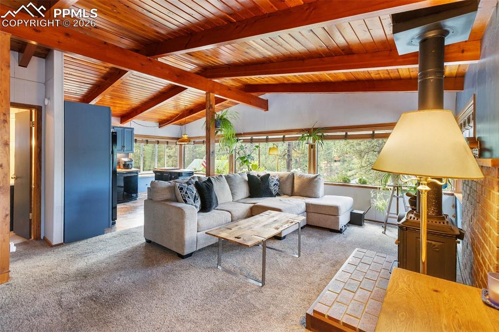 Image 5 of 46: Open Living Room featuring wood ceiling