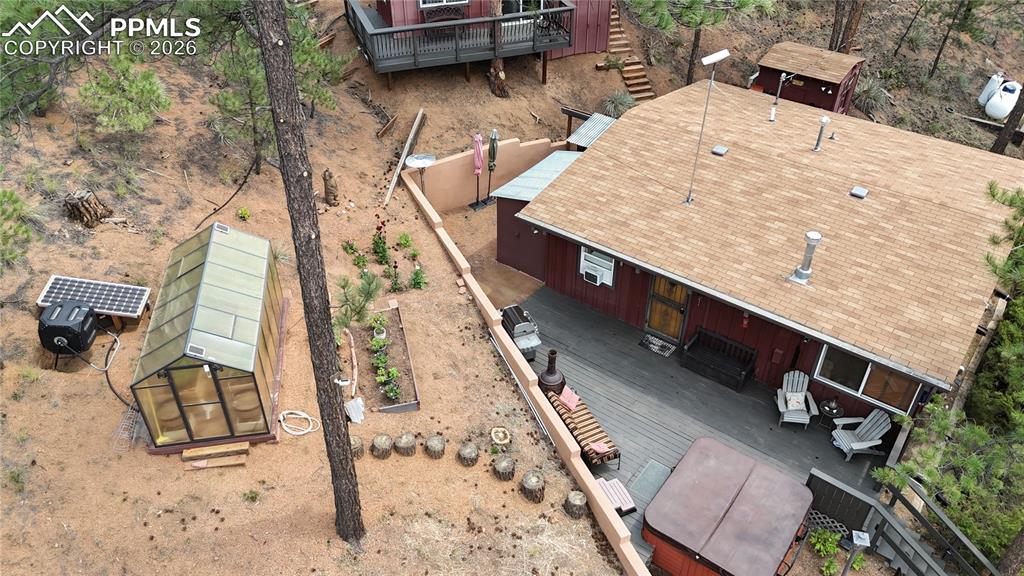 Image 9 of 46: Home and Greenhouse with solar powered