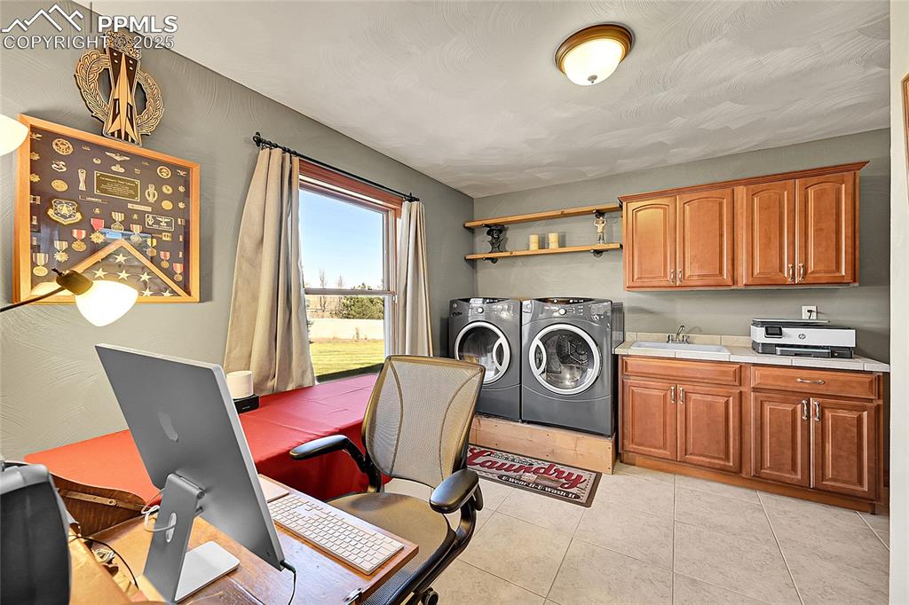 Image 33 of 49: Main Level Laundry/Office area