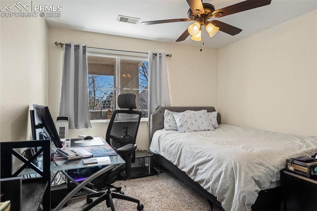 Image 19 of 36: Bedroom