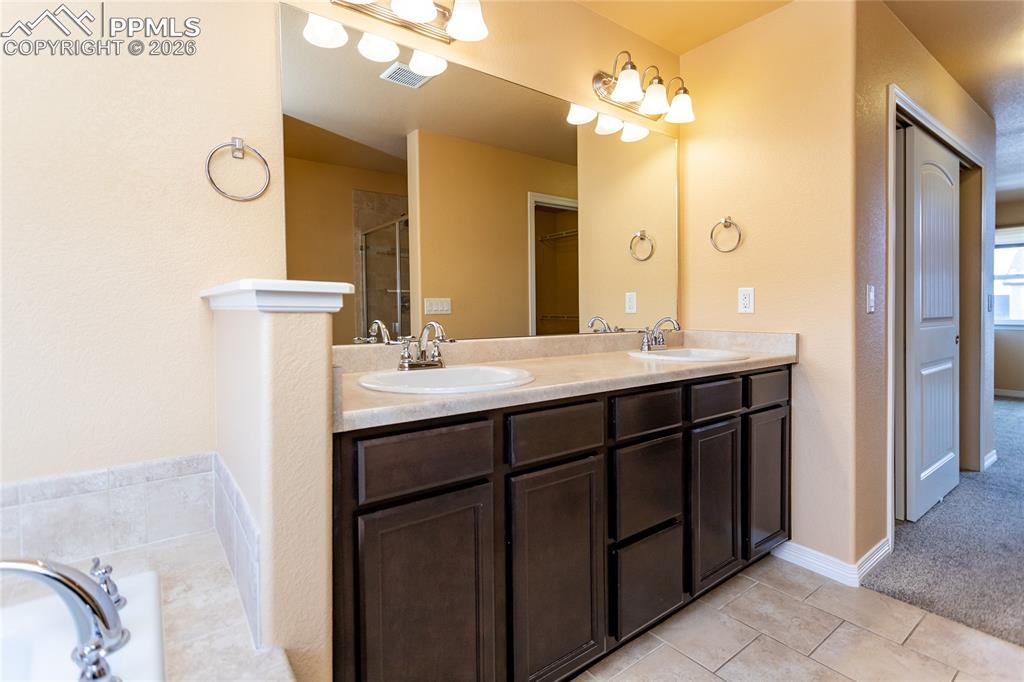 Image 14 of 49: Master Bathroom