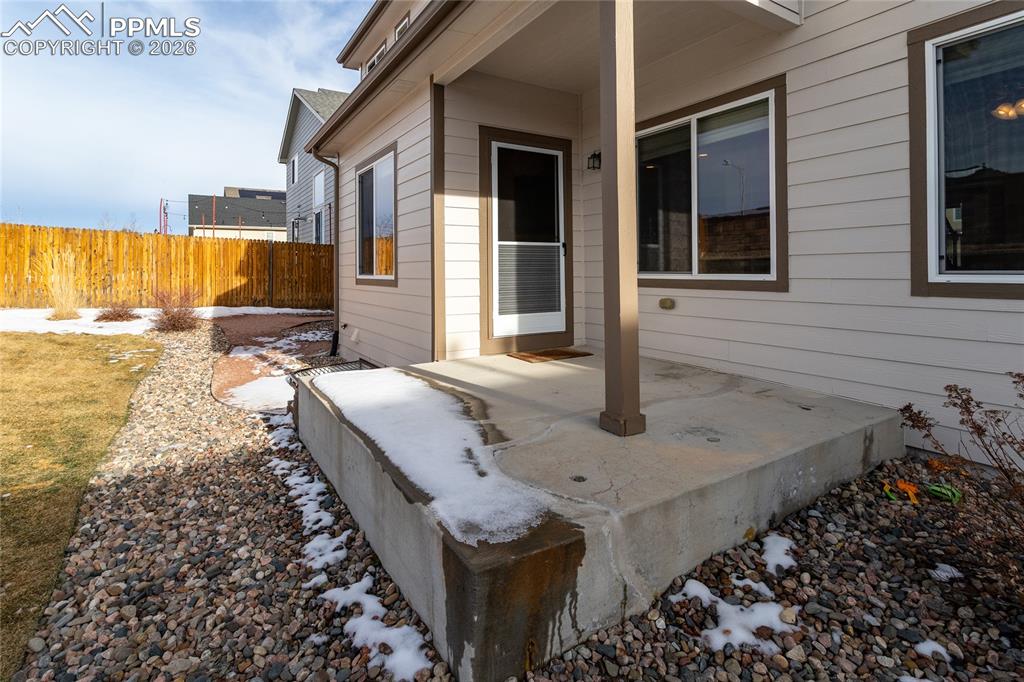 Image 41 of 49: Covered rear patio