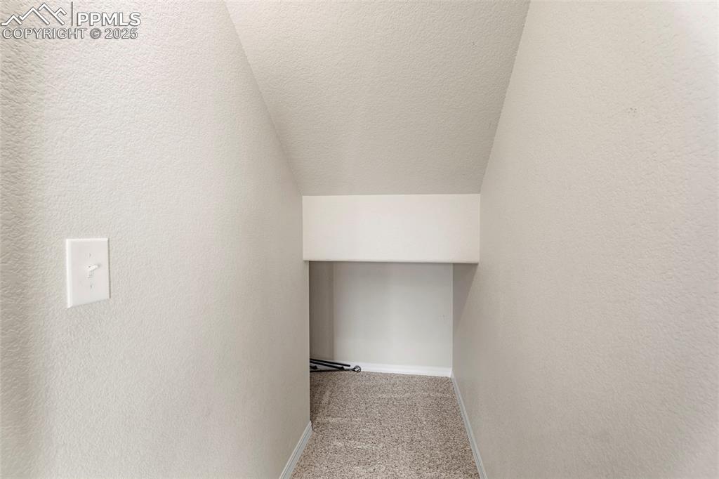 Image 11 of 26: Under stairs closet. 