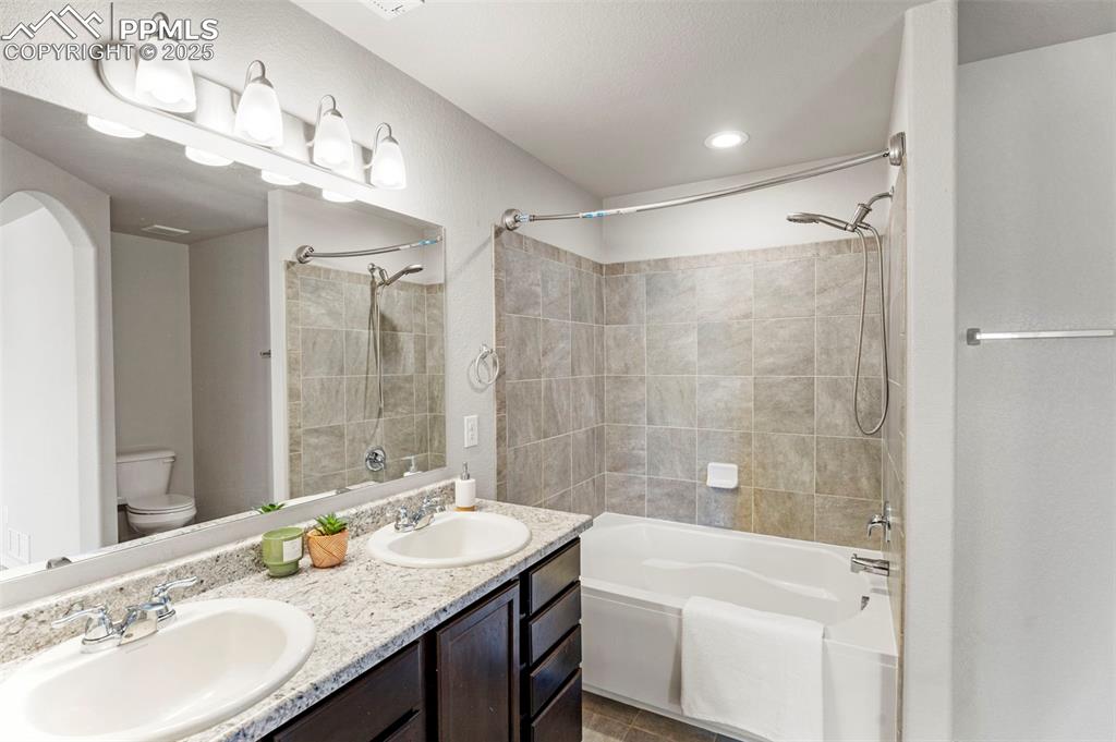 Image 17 of 26: Primary bathroom with large soaker tub. 