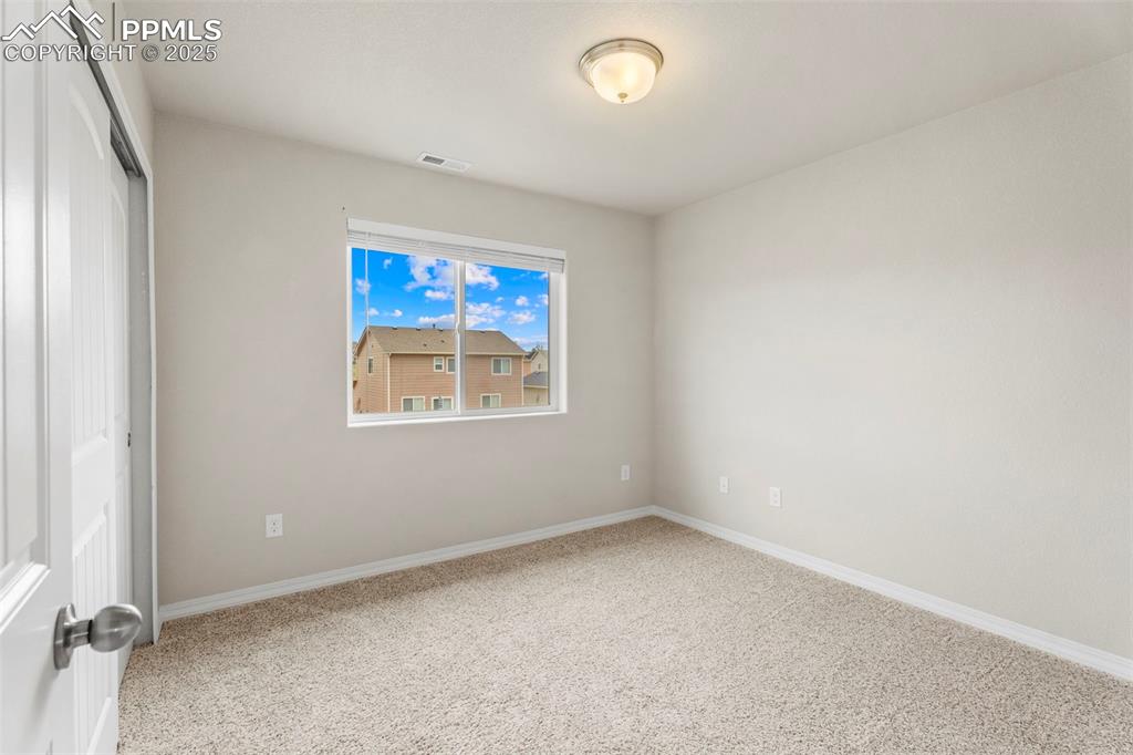 Image 19 of 26: 2nd upper level bedroom.
