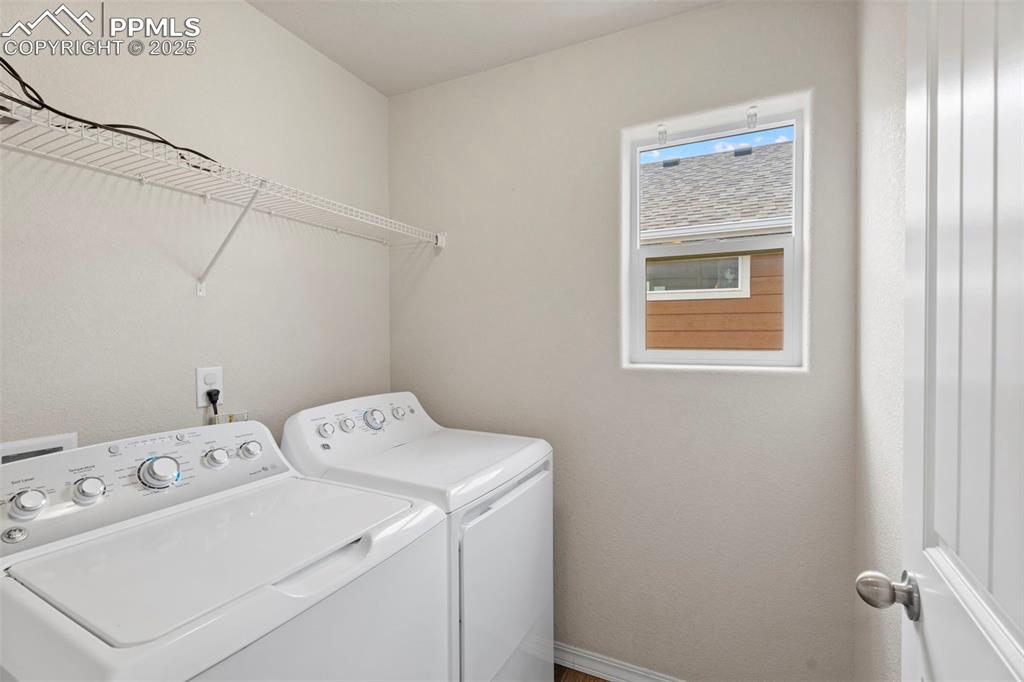 Image 22 of 26: Upper level laundry. 