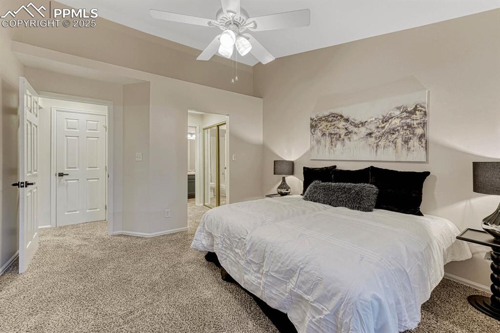 Image 14 of 50: Primary bedroom with ensuite bathroom