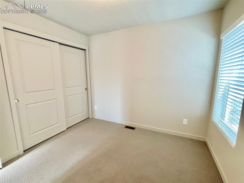 Image 7 of 23: Bedroom