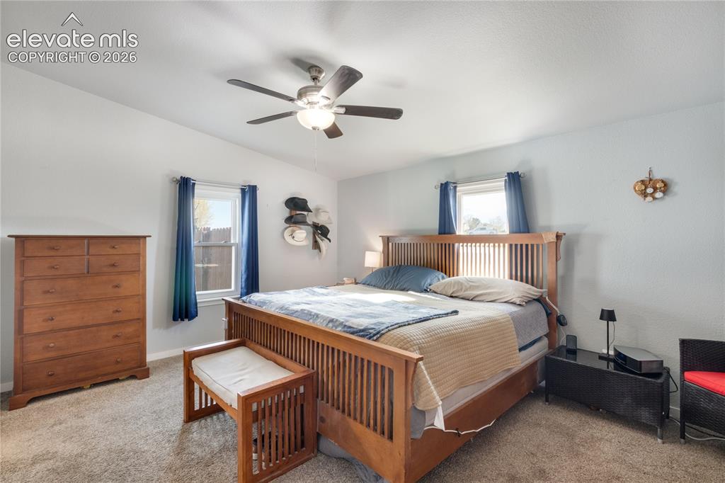 Image 15 of 36: Large Primary Bedroom with lots of light from the two windows