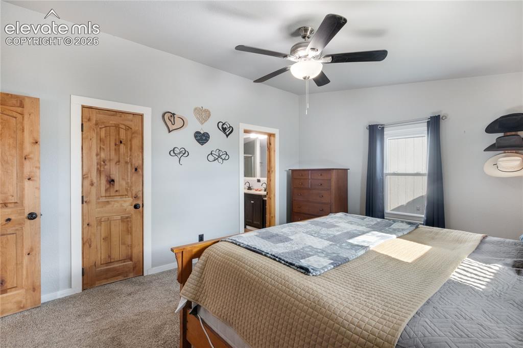 Image 17 of 36: Primary Bedroom with plenty of closet space and a large attached bathroom