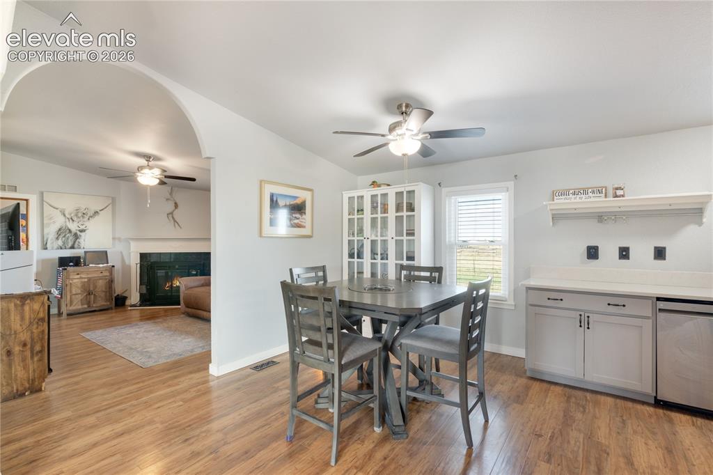 Image 7 of 36: Dining Room between the kitchen and Family Room for easy entertaining. Gran