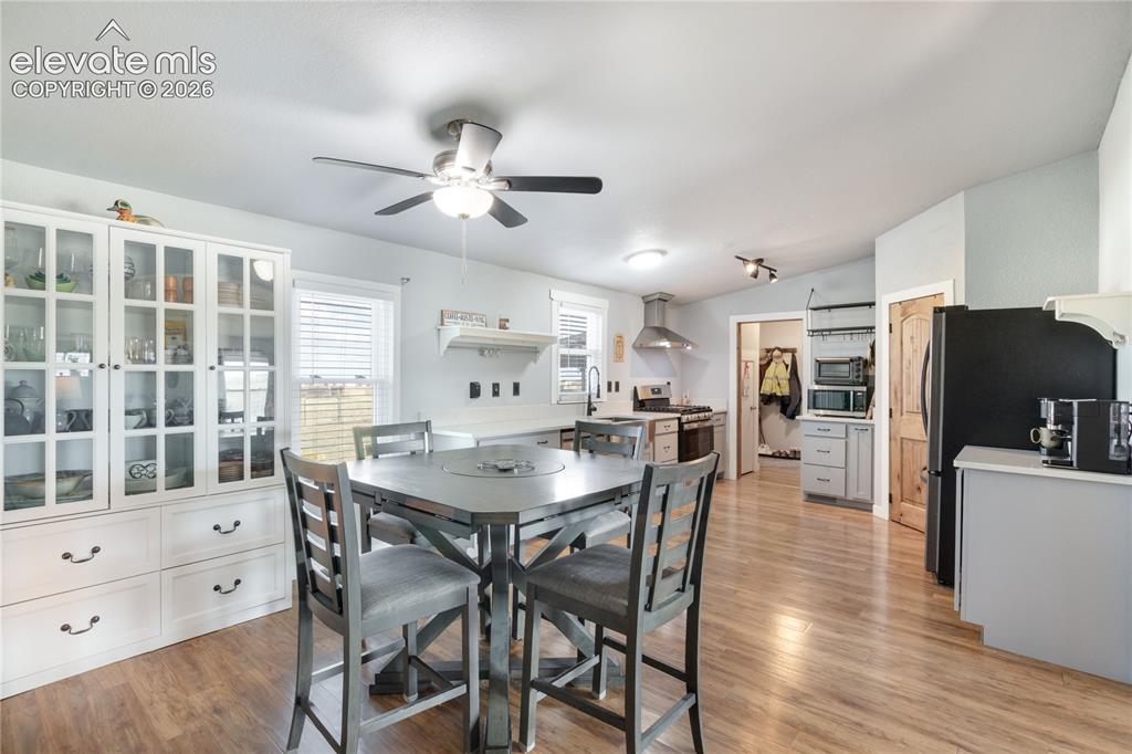 Image 8 of 36: Another view of the Dining Room looking toward the kitchen. Very open and r