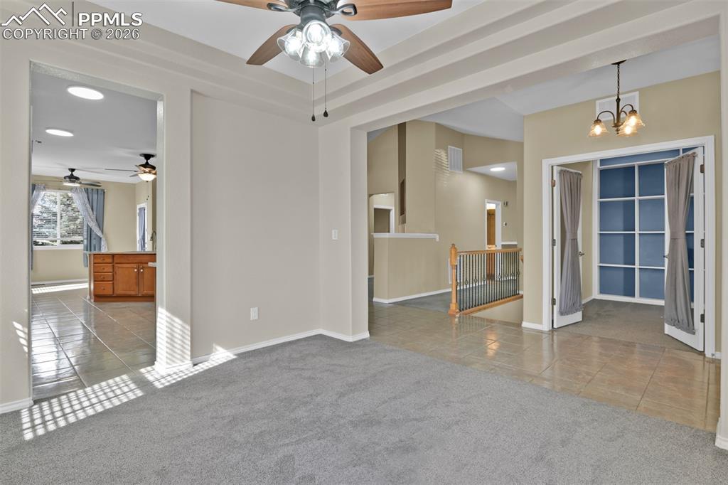 Image 11 of 50: Entry with view of formal dining room
