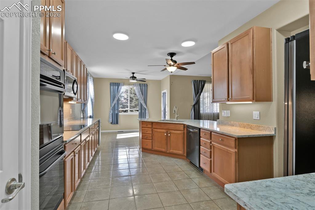 Image 15 of 50: Kitchen with pantry