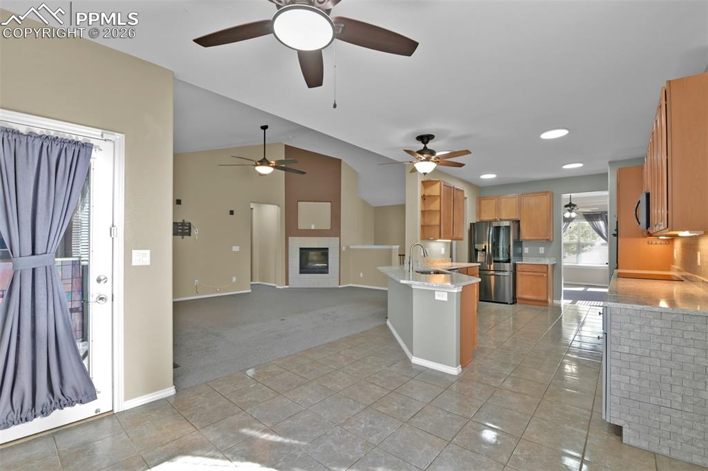 Image 17 of 50: Eating nook with walk-out to the oversized covered patio