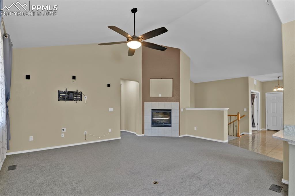 Image 19 of 50: Living room with gas burning fireplace