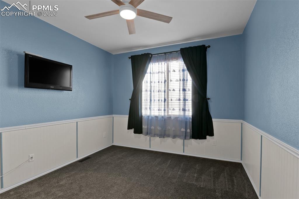 Image 25 of 50: 2nd bedroom on main level 