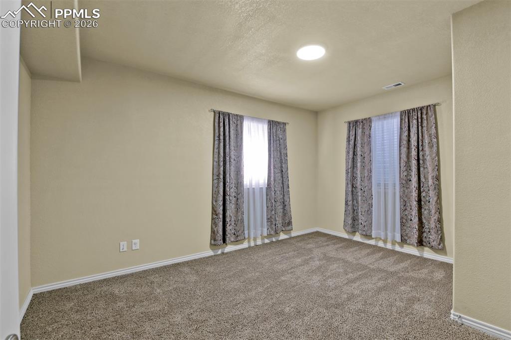 Image 38 of 50: 5th bedroom