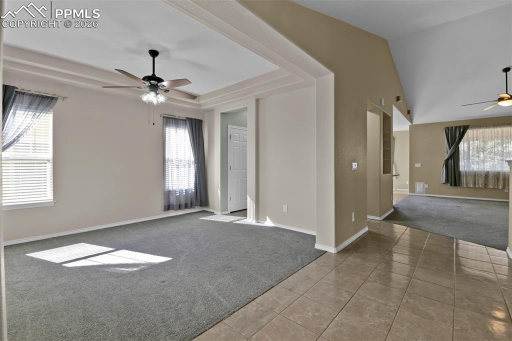 Image 9 of 50: Entry with view of formal dining room
