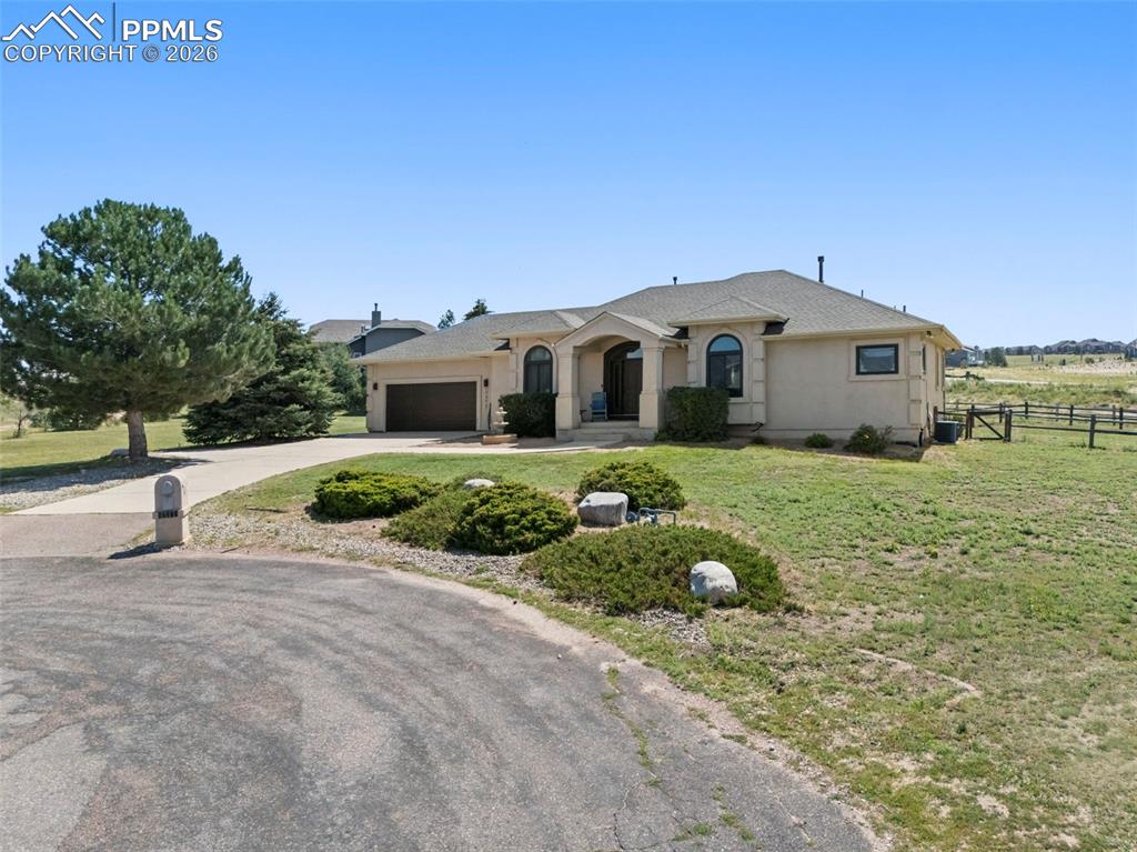 Image 13 of 47: End of cul-de-sac front of property with concrete driveway, an attached ga