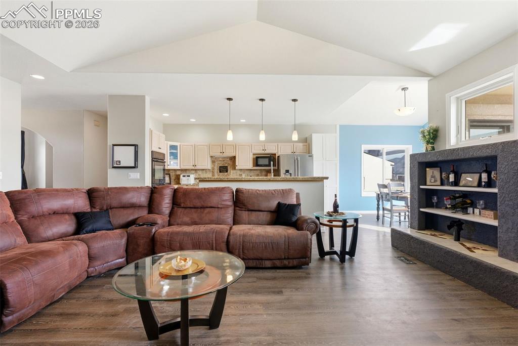 Image 19 of 47: Living area is a grand great room open floor plan