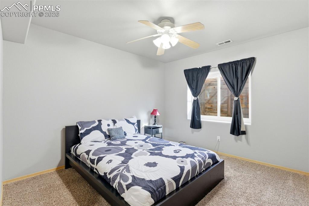Image 42 of 47: 3 bedrooms in the basement all with ceiling fans