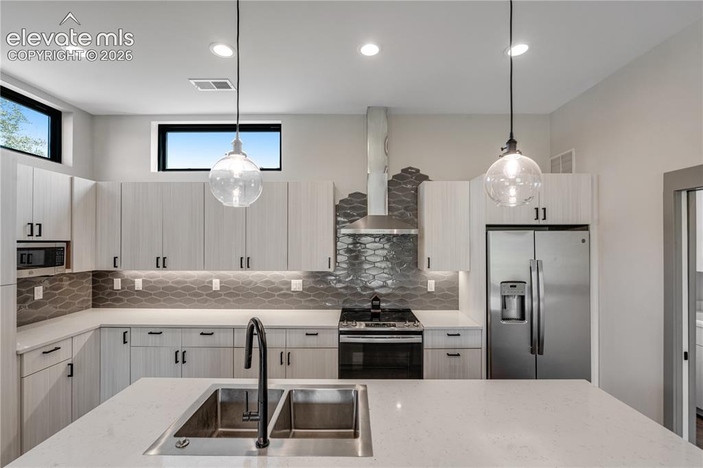 Image 13 of 45: Kitchen with Lots of Cabinet Space 