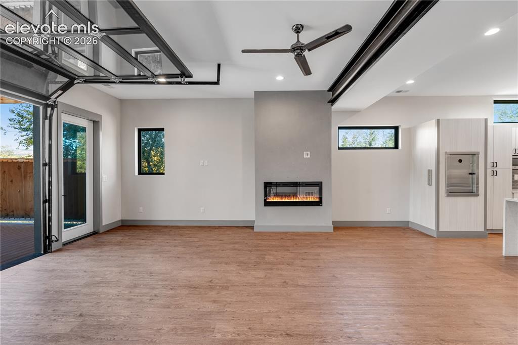 Image 18 of 45: Living Room with Gas Fireplace