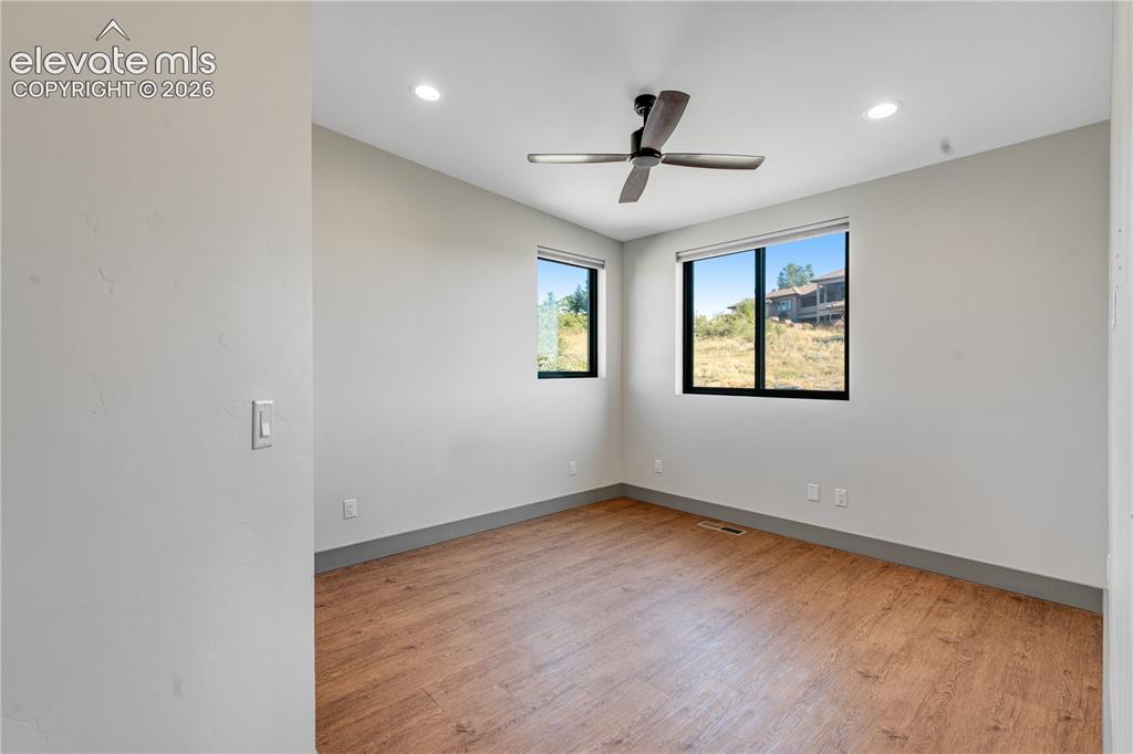 Image 31 of 45: Bedroom with Vaulted Ceiling