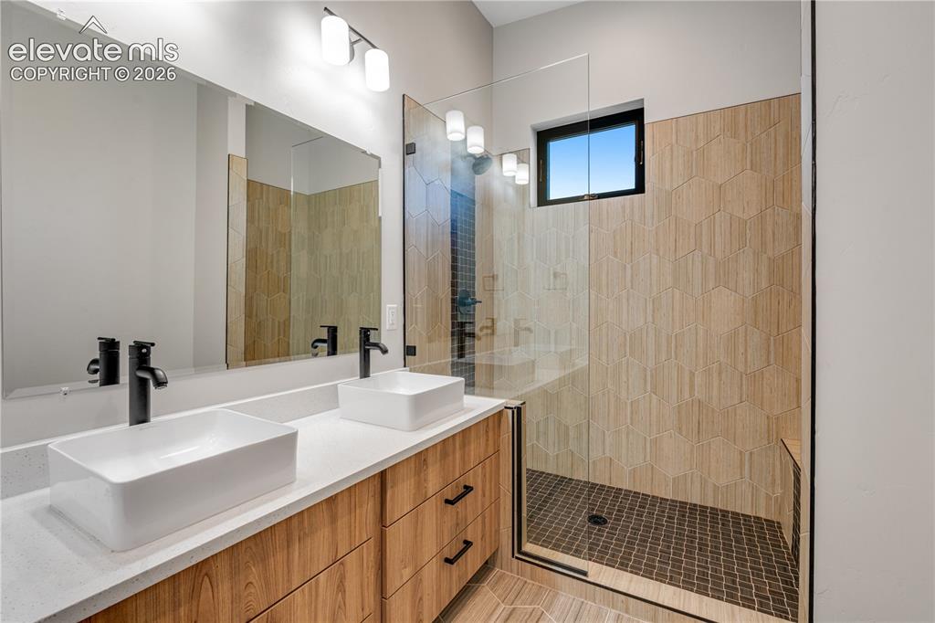 Image 33 of 45: Three Quarter Bathroom with Tile Flooring