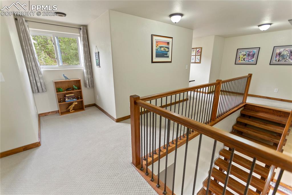 Image 30 of 40: Upper Level Balcony  Game Room