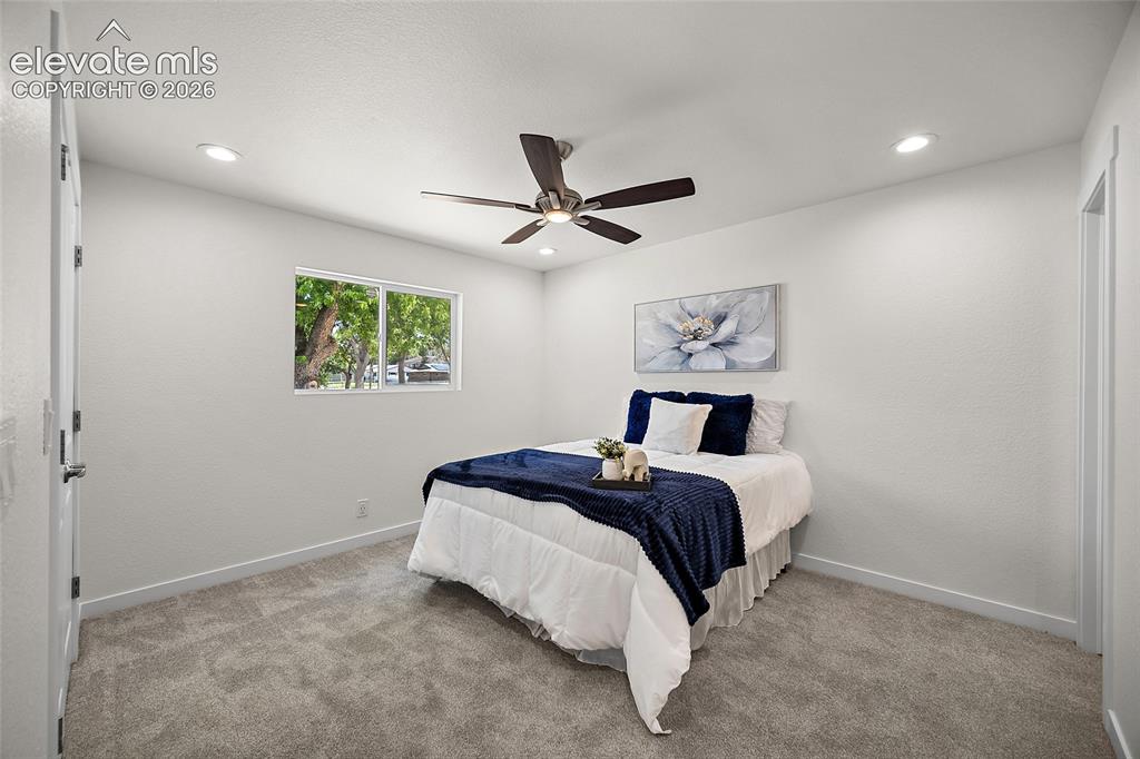 Image 19 of 39: Primary Bedroom with attached bathroom