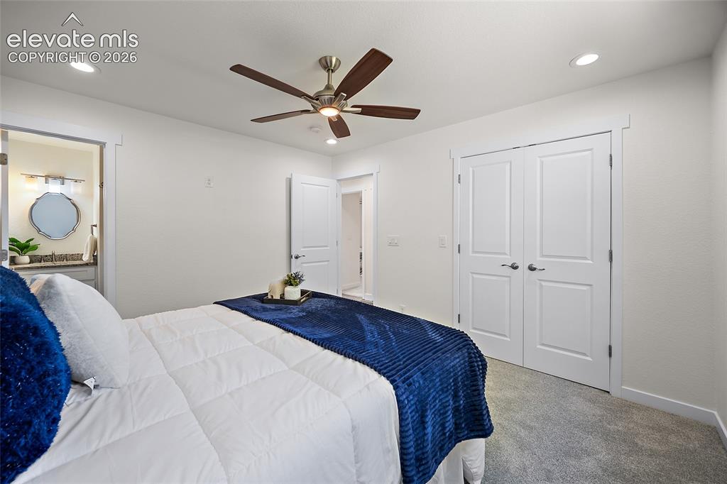 Image 21 of 39: Primary Bedroom with attached bathroom