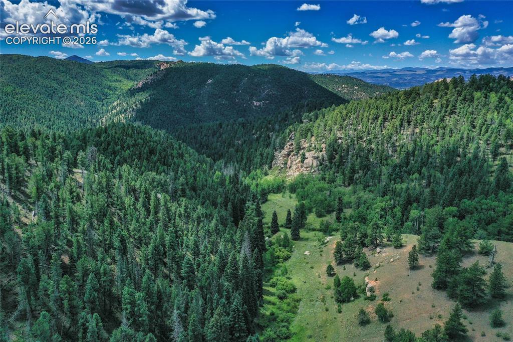 Image 3 of 50: View from deck looking toward Dome Rock and Sangre de Cristos.