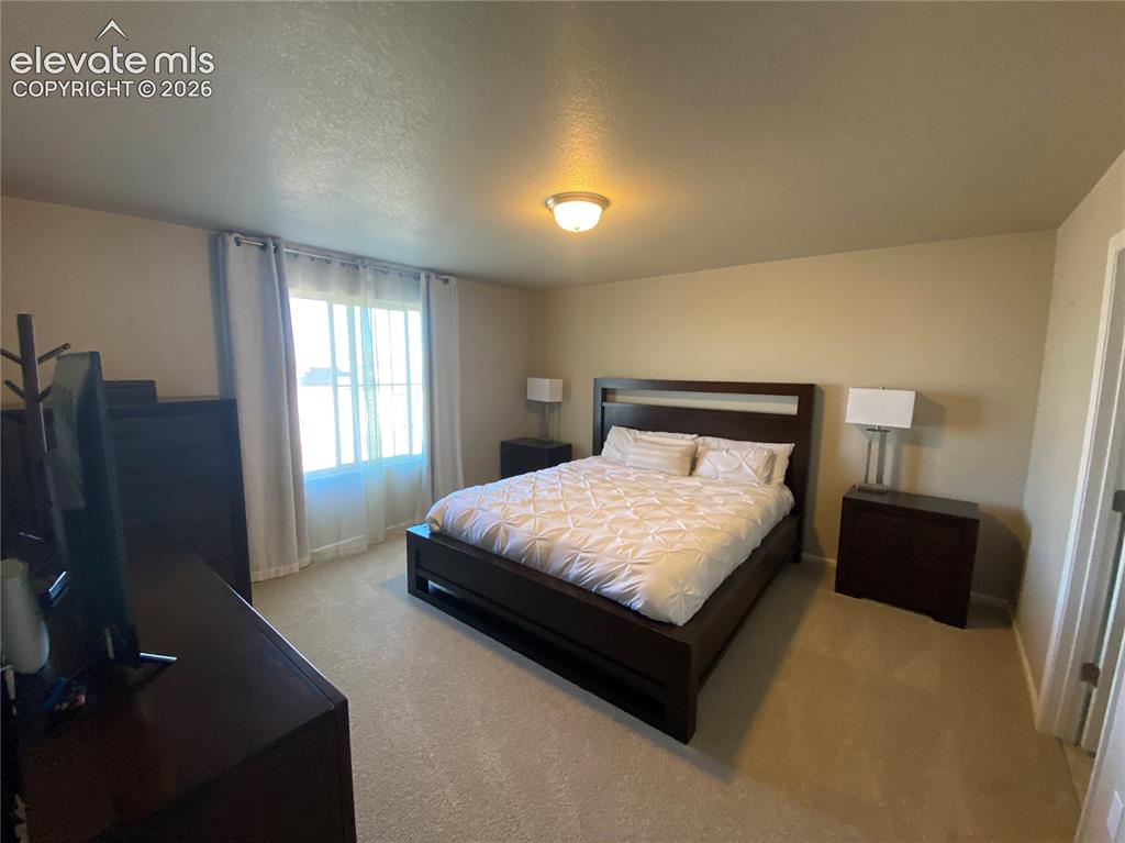 Image 14 of 25: Bedroom